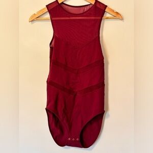 Free People- intimately burgundy one piece body suit with mesh cut outs
